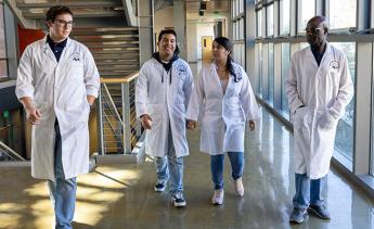 STEM interns walking in the Math & Science Building at Los Angeles Mission College